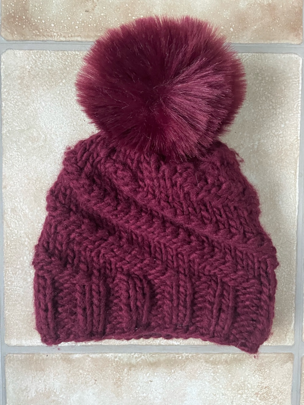 Free People burgundy knitted winter wool blend knit faux fur pom pom; O/S